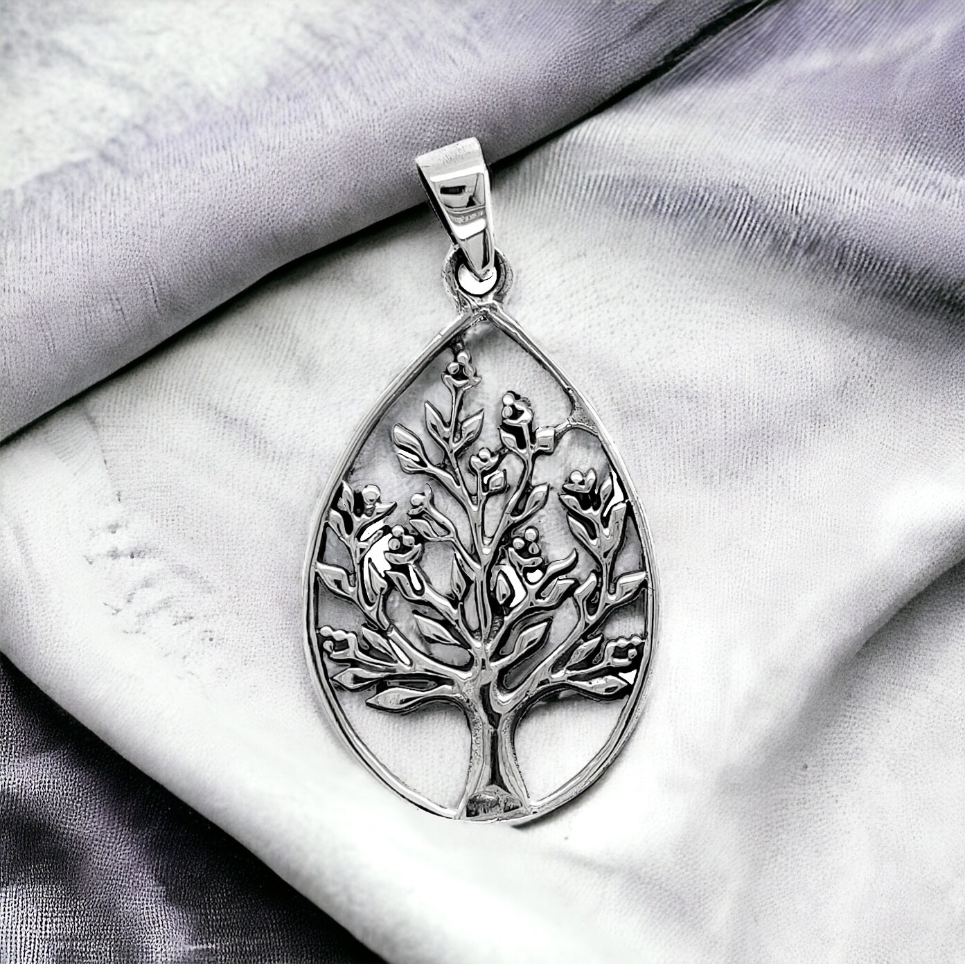 Sterling Silver Celtic Tree of Life Teardrop Pendant, representing Celtic generational history. 