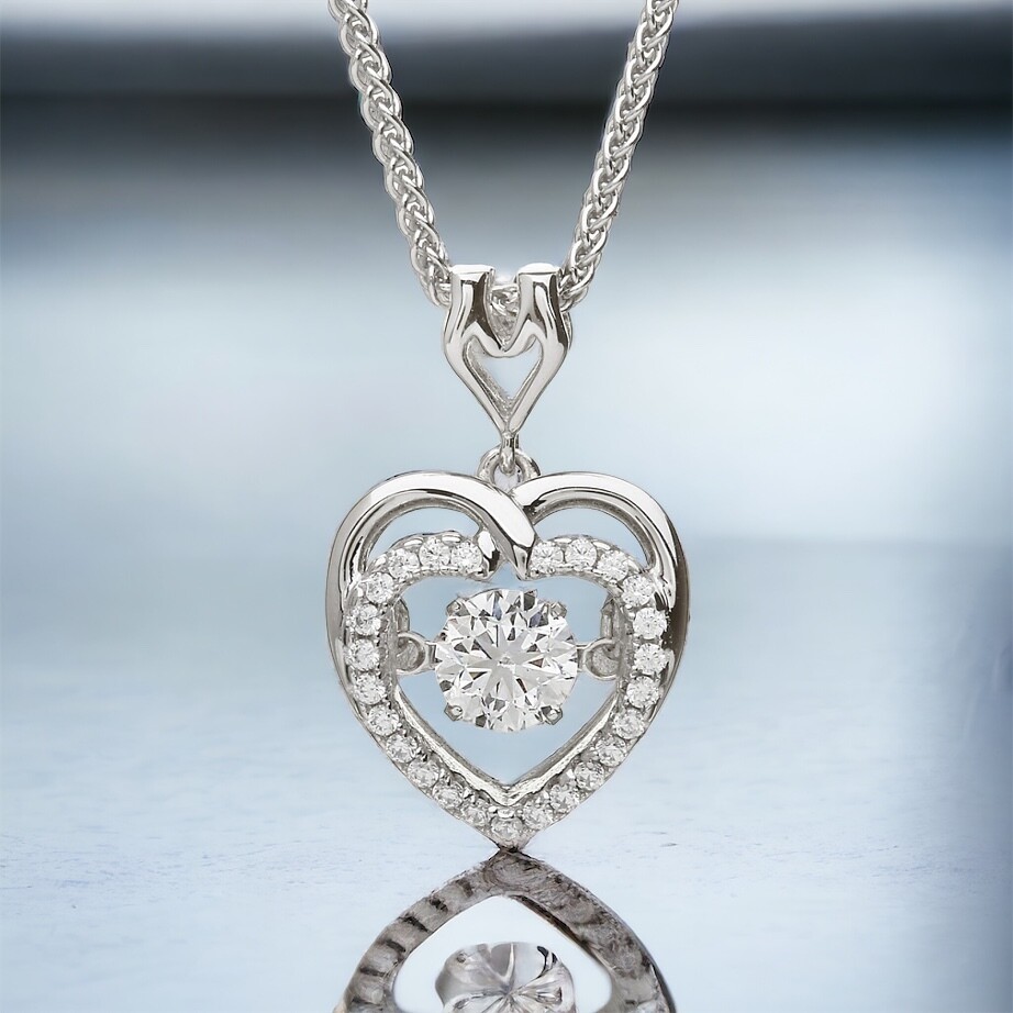 Sterling silver Celtic heart pendant reflection