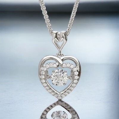 Sterling silver Celtic heart pendant reflection