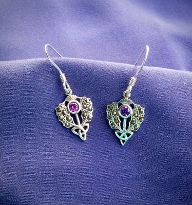 Sterling silver Scottish thistle drop earrings with trinity knot design and central marcasite stone.