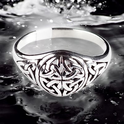 Trinity Knot Sterling Silver Celtic Ring on Water background